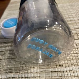 Lokai Plastic Water Bottle with find your balance saying in bottom of bottle